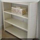 F59. One of a pair of bookcases with open backs. 42”h x 42”w x 17”d 